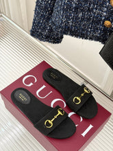 SLIDE SANDALS IN BLACK FABRIC EMBOSSED LOGO